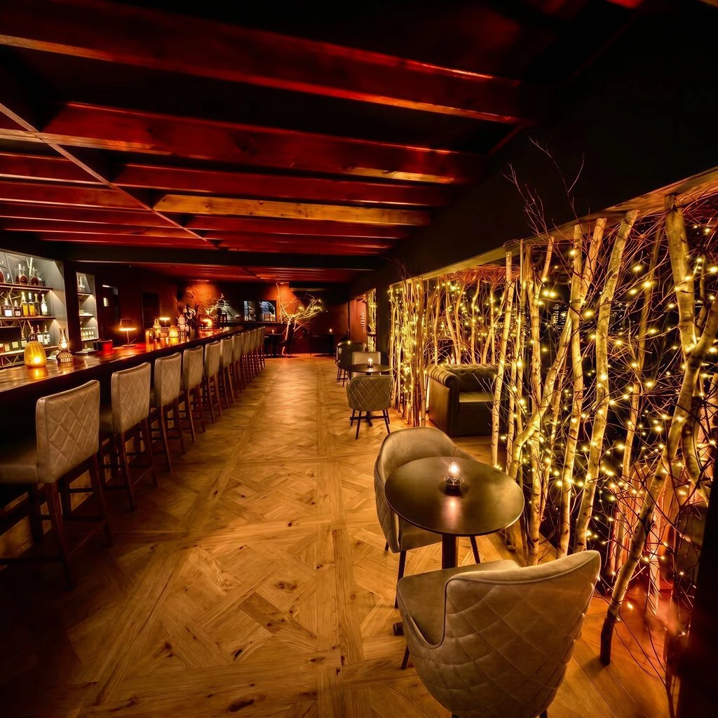 The warmly lit bar inside Trails End Tavern